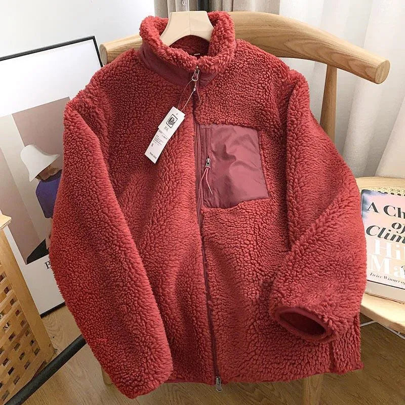 Women's sherpa fleece jacket with high collar, front zip and chest pocket