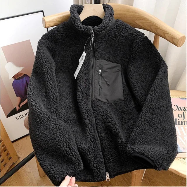 Women's sherpa fleece jacket with high collar, front zip and chest pocket