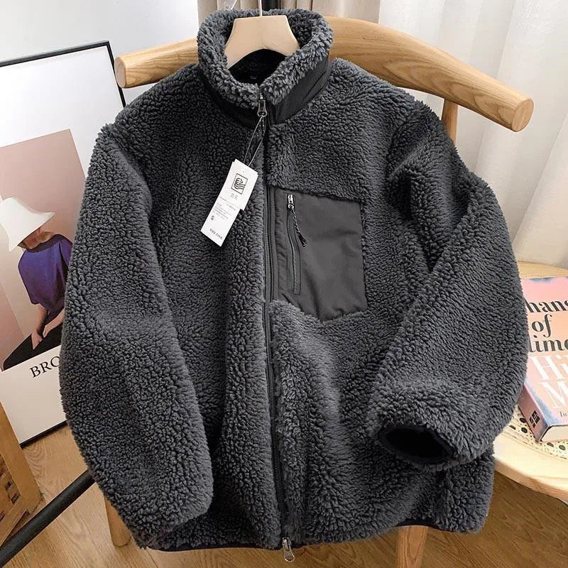 Women's sherpa fleece jacket with high collar, front zip and chest pocket