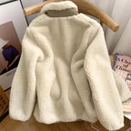 Women's sherpa fleece jacket with high collar, front zip and chest pocket