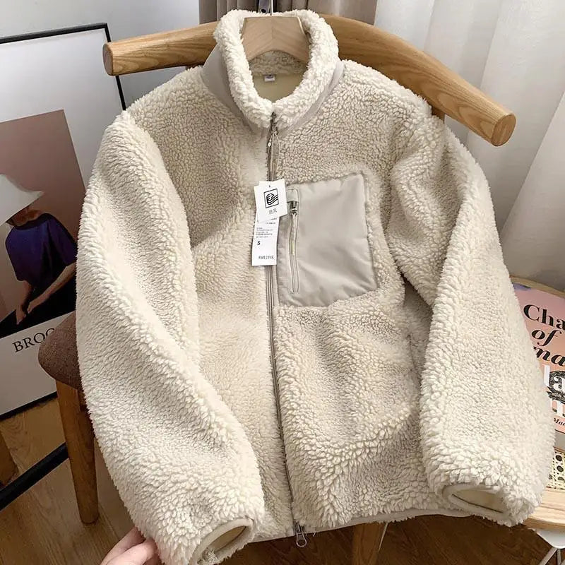 Women's sherpa fleece jacket with high collar, front zip and chest pocket