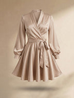 Women's long-sleeved wrap mini dress with a tie waist and flared skirt