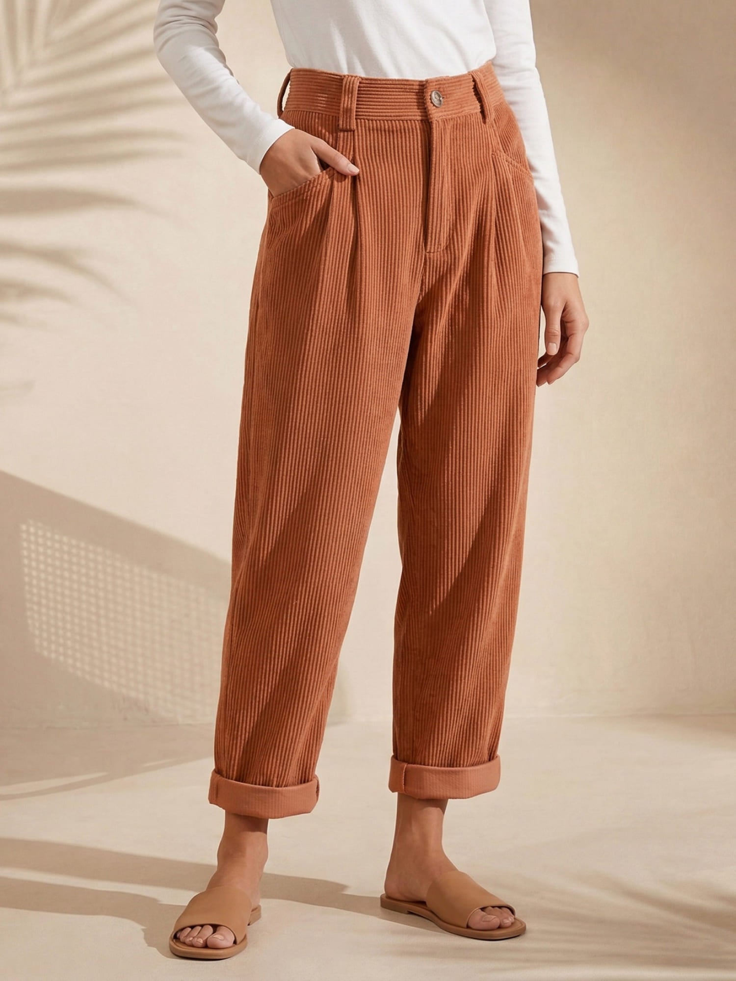 Women's high-waisted ribbed trousers with straight cropped legs and turned-up cuffs