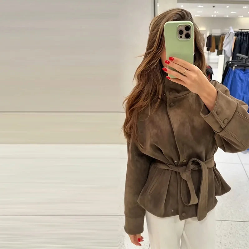 Women's brown belted jacket with high collar, long sleeves and button cuffs