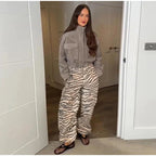 Women's grey cropped bomber jacket with mock neck and flap pockets