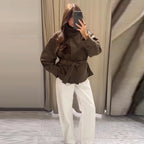 Women's brown belted jacket with high collar, long sleeves and button cuffs