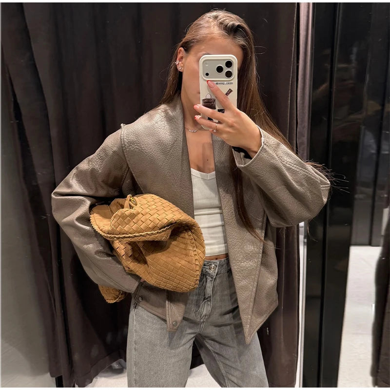 Women's grey cropped bomber jacket with mock neck and flap pockets