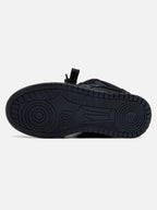 Black high-top skate sneakers with tonal camouflage side panels and lace-up fronts