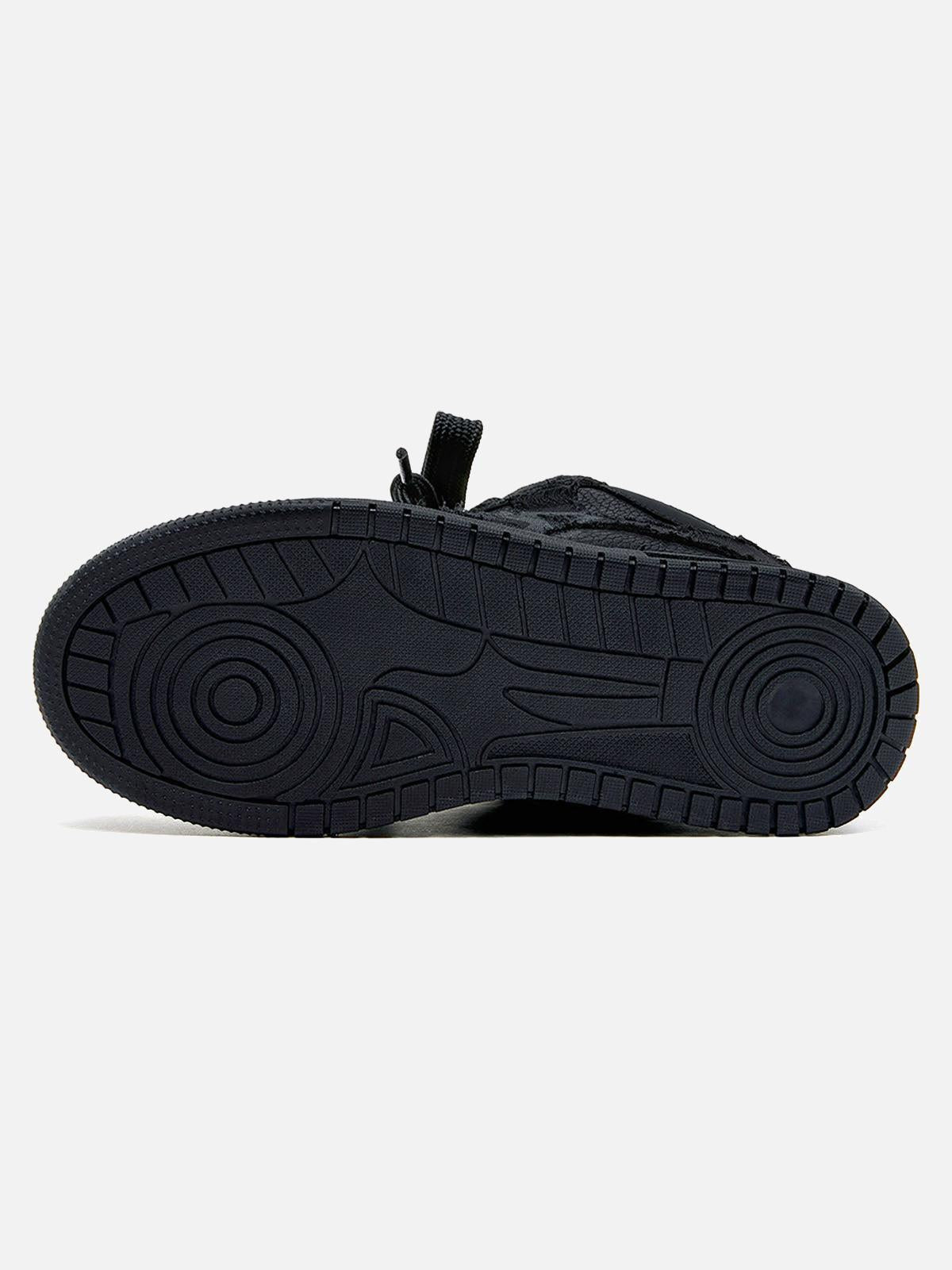 Black high-top skate sneakers with tonal camouflage side panels and lace-up fronts