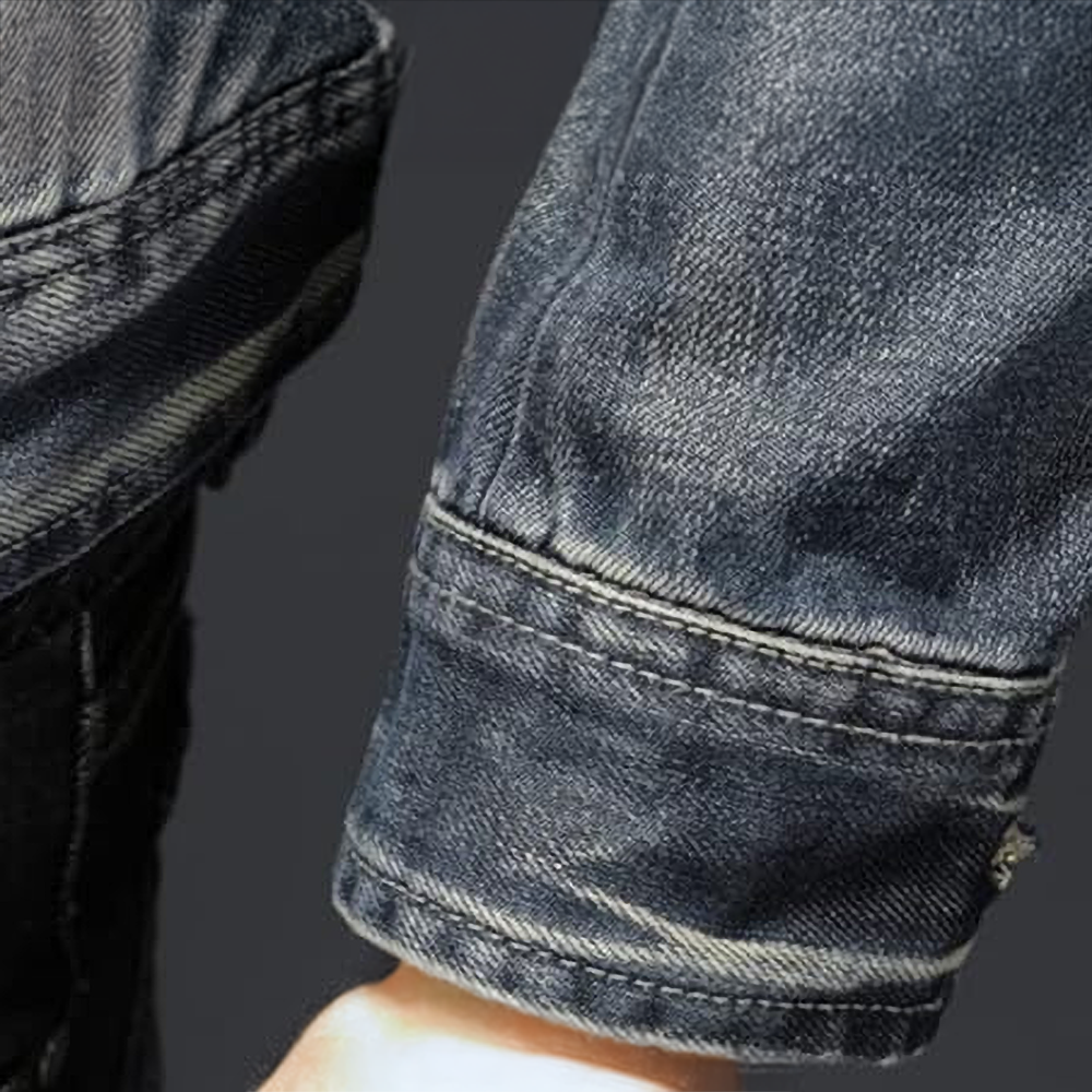 Men's blue denim jacket with mandarin collar, long sleeves and multiple zipped pockets