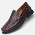 Men's perforated slip-on loafer with moccasin stitching and flat sole