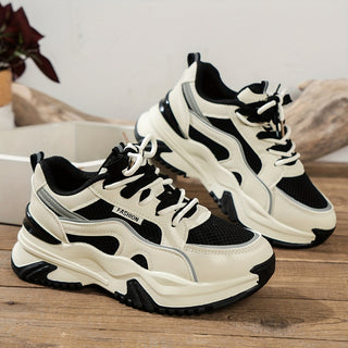 Women's chunky lace-up trainers with raised soles and panelled uppers