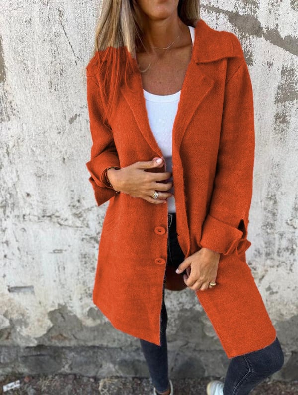 Women's longline button front coat with notched lapels and long sleeves