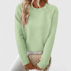 Women's crew neck knitted jumper with long sleeves and upper front button detail