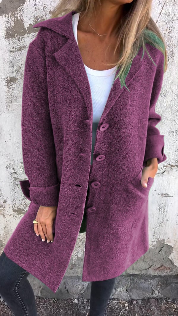 Women's longline button front coat with notched lapels and long sleeves