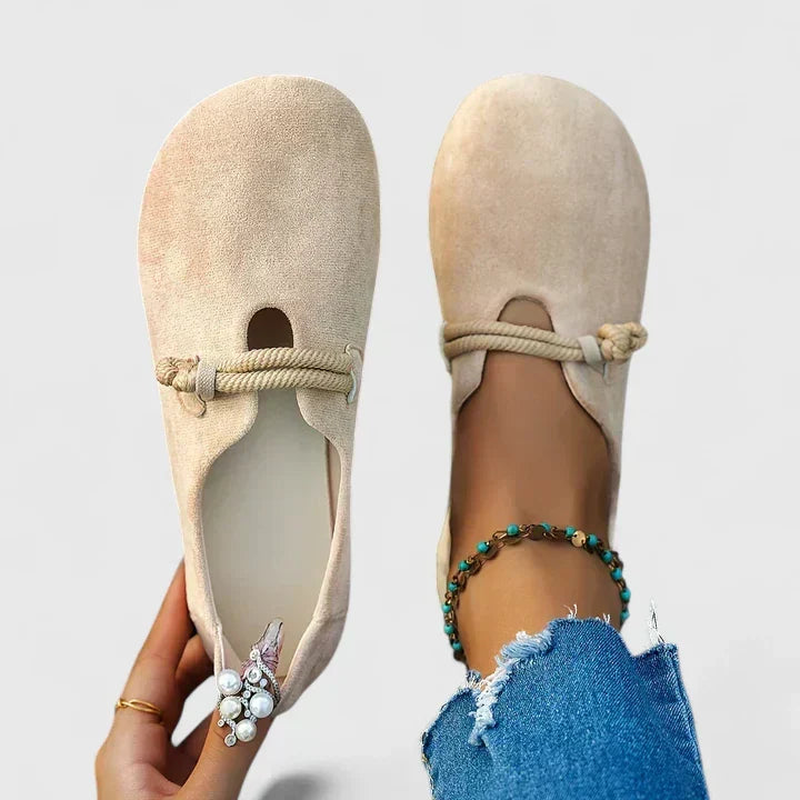 Women's slip-on loafers with rounded toes, rope trim and flat soles