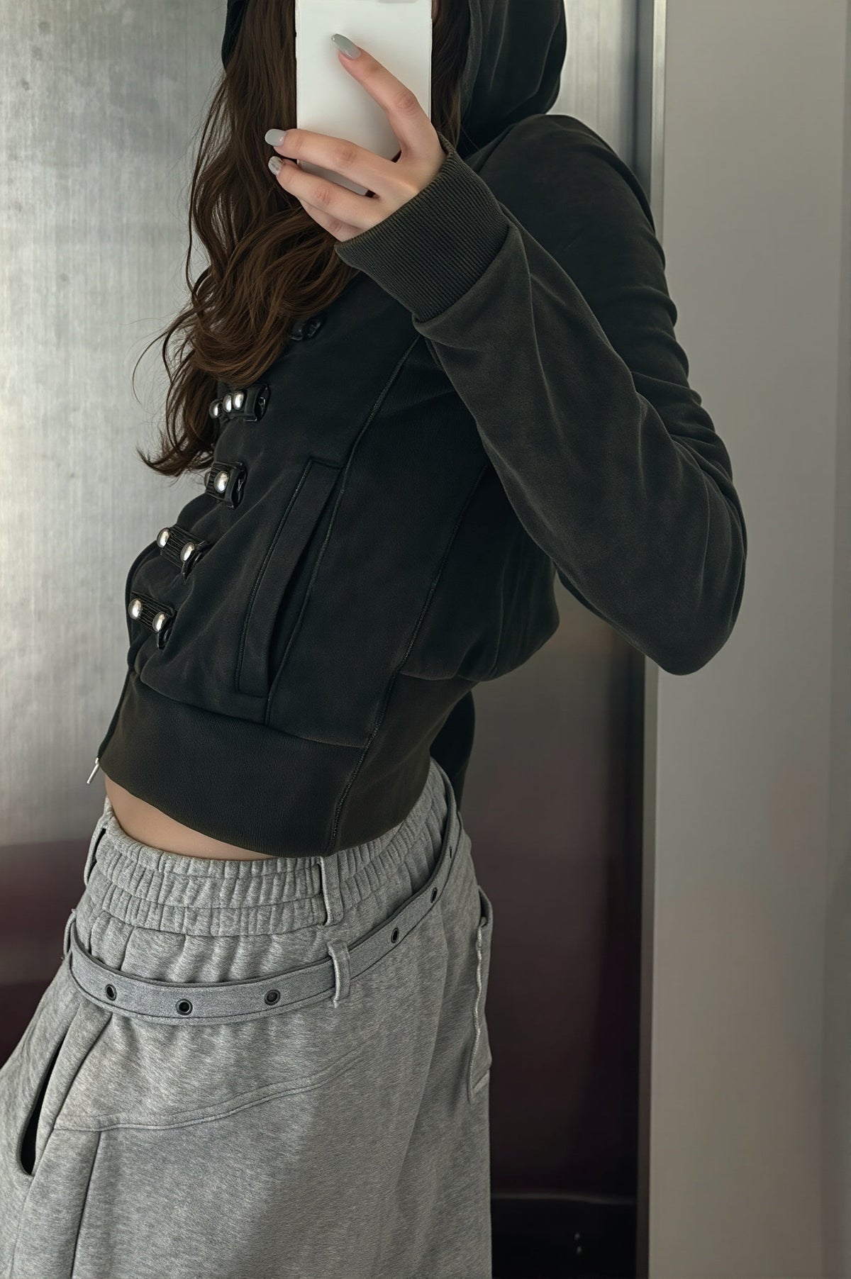 Women's black fitted cropped hoodie with hood, front zip and silver-tone stud detailing
