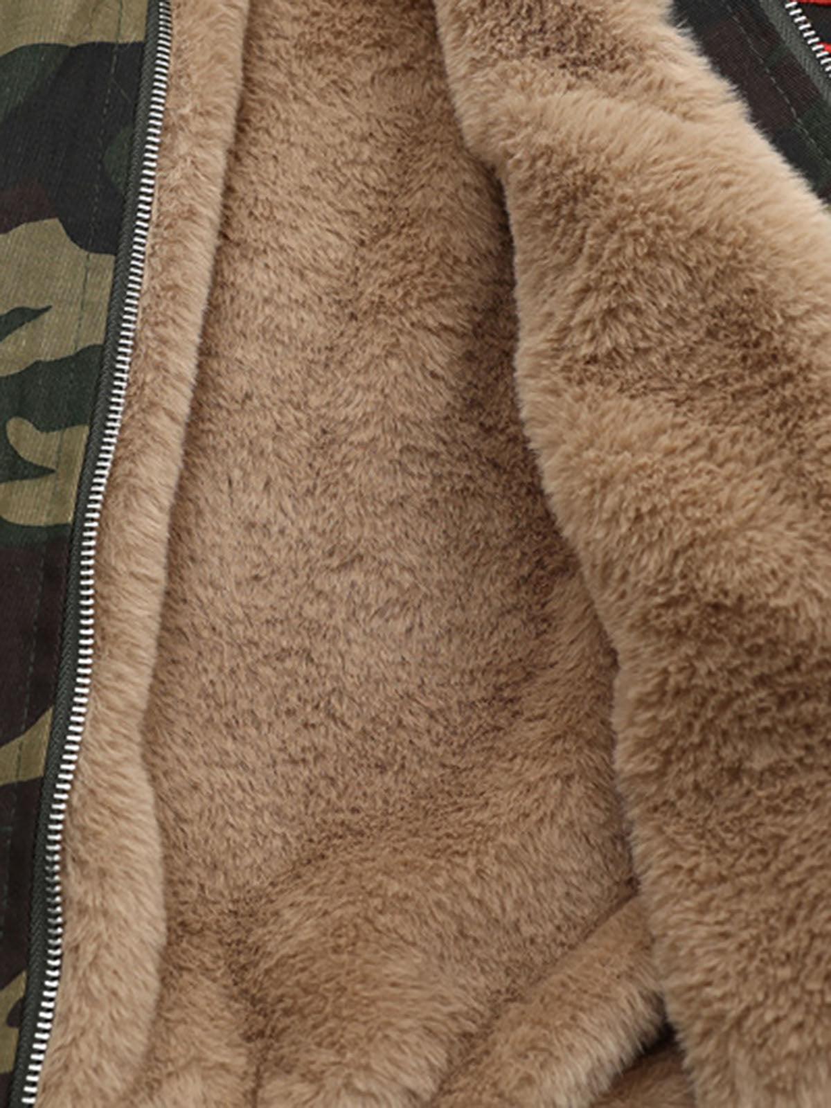 Green camouflage hooded jacket with tan fur-effect trim and red embroidery