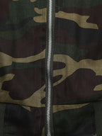 Green camouflage hooded jacket with tan fur-effect trim and red embroidery
