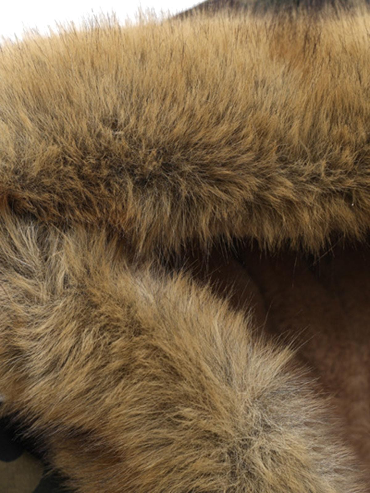 Green camouflage hooded jacket with tan fur-effect trim and red embroidery