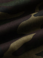 Green camouflage hooded jacket with tan fur-effect trim and red embroidery