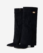 Women's black knee-high boots with pointed toes, low heels and buckle strap details