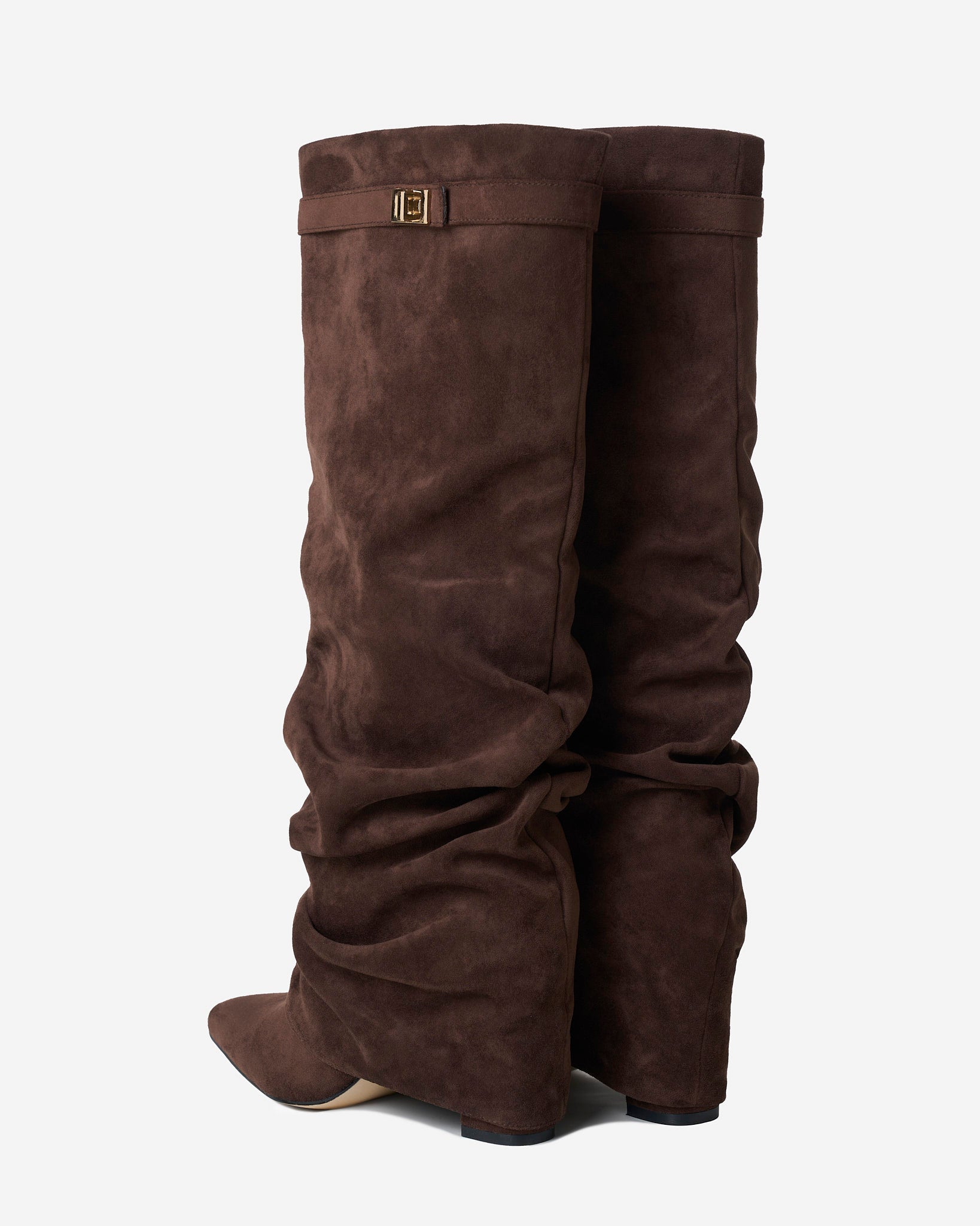 Women's brown slouchy knee-high boots with pointed toes, low heels and buckle straps