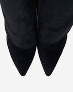 Women's black knee-high boots with pointed toes, low heels and buckle strap details