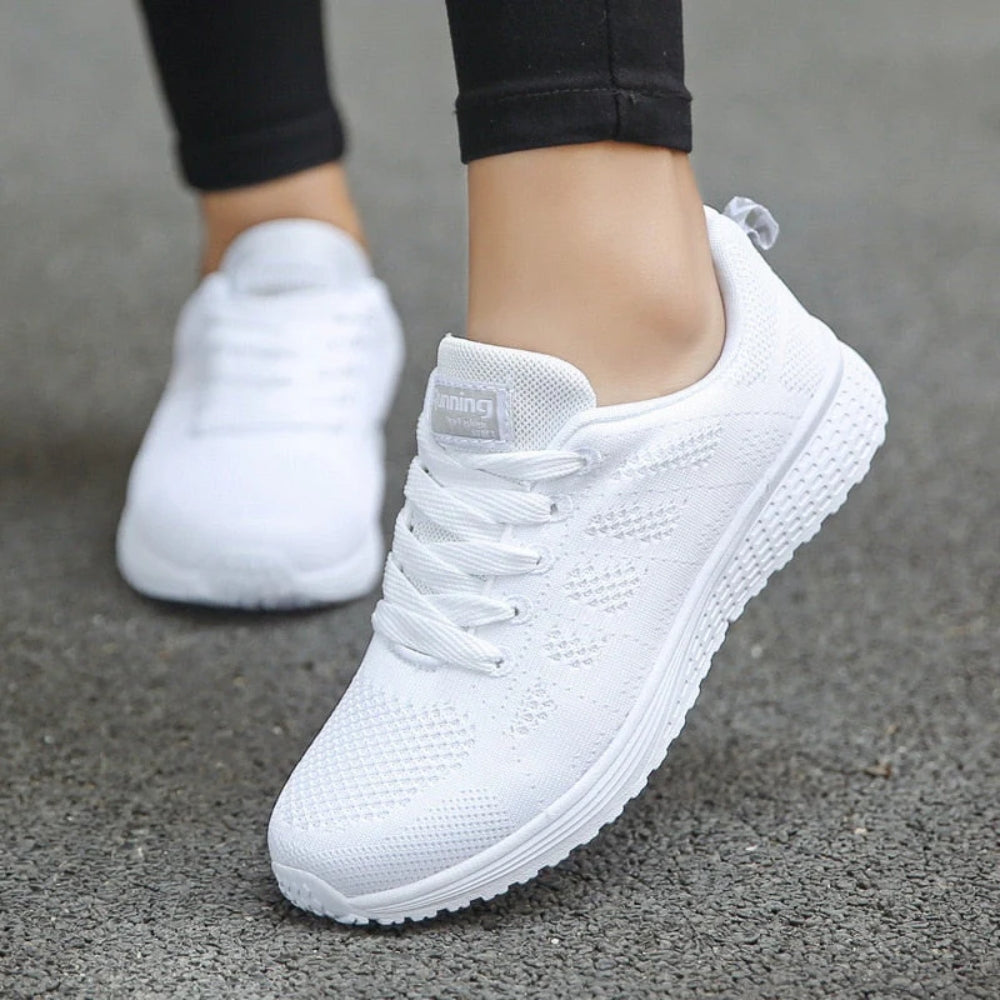 Women's lace-up trainers with a textured upper and layered sole