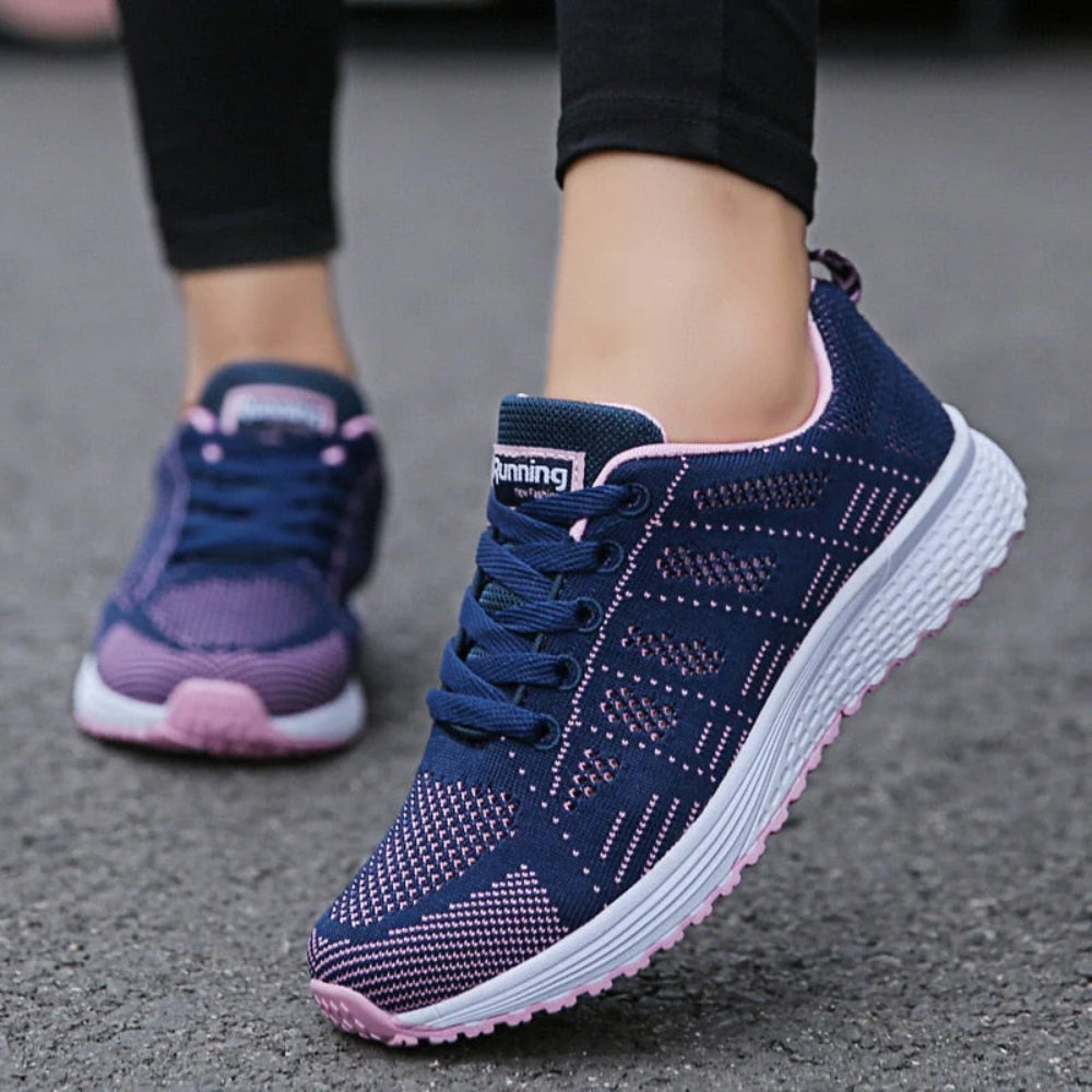 Women's lace-up trainers with a textured upper and layered sole