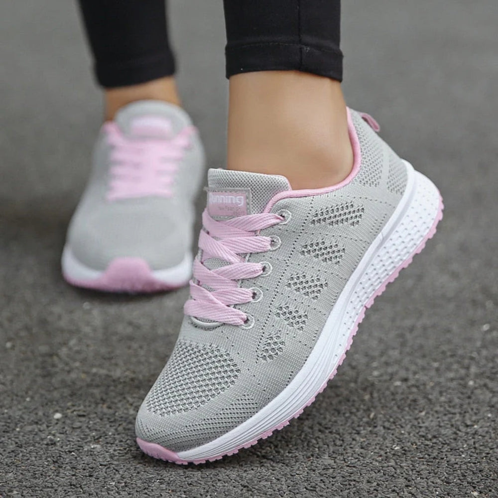 Women's lace-up trainers with a textured upper and layered sole