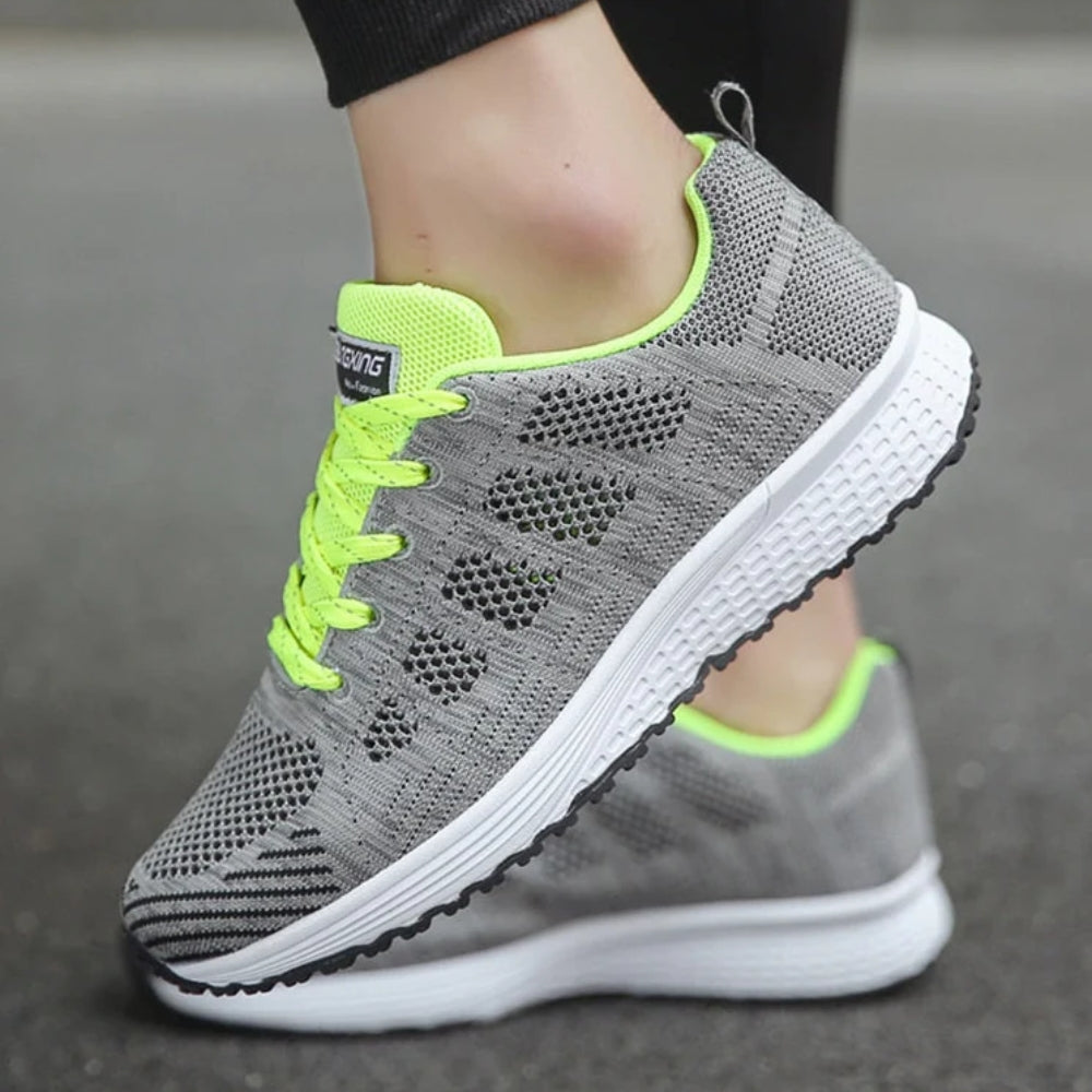 Women's lace-up trainers with a textured upper and layered sole