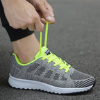 Women's lace-up trainers with a textured upper and layered sole