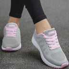 Women's lace-up trainers with a textured upper and layered sole