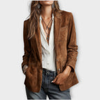 Women's vintage blazer with notched lapels, button front and patch pockets