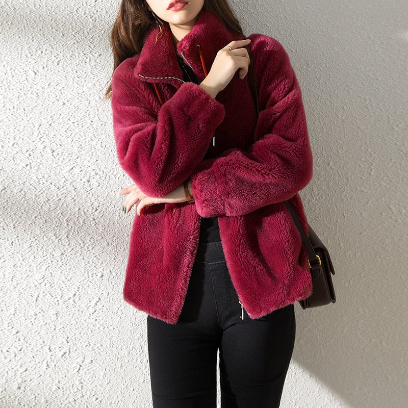 Women's plush fleece jacket with high collar, long sleeves and front zip