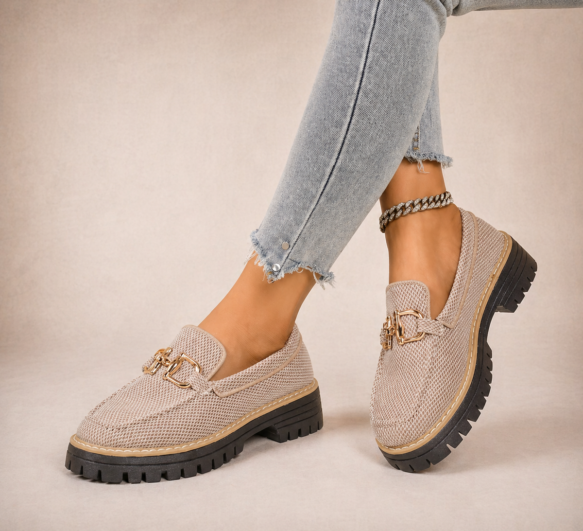 Women's beige mesh loafers with gold-tone horsebit trim and chunky black soles
