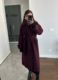 Women's burgundy long belted trench coat with double-breasted buttons and lapels