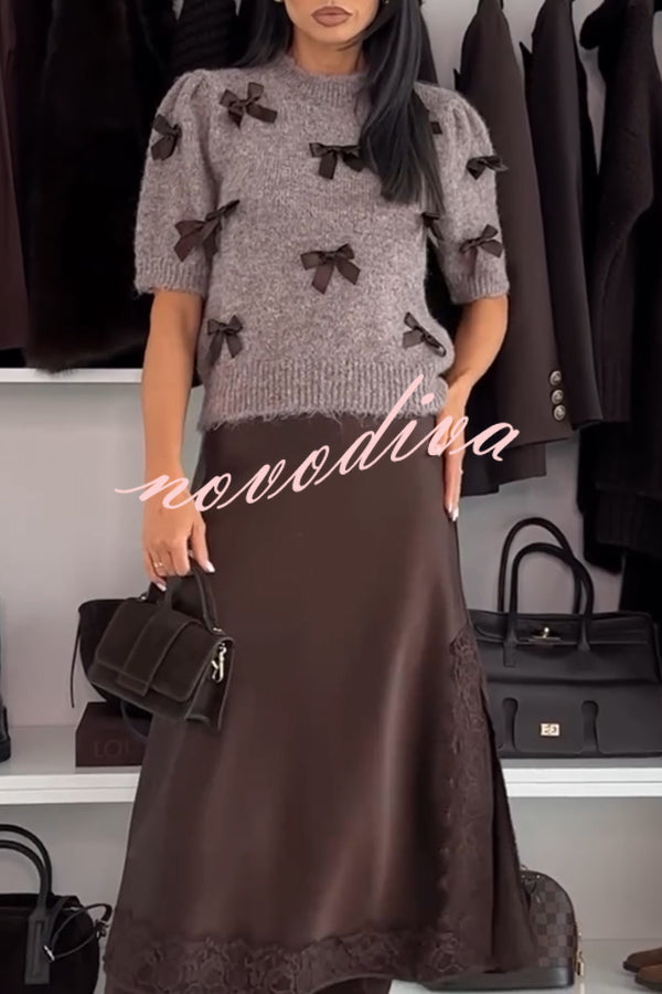 Women's taupe knitted crop top with dark bow details and short sleeves