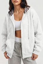 Women's oversized zip hoodie with leopard-print lined hood and front pockets