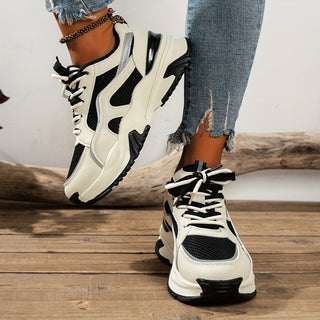 Women's chunky lace-up trainers with raised soles and panelled uppers