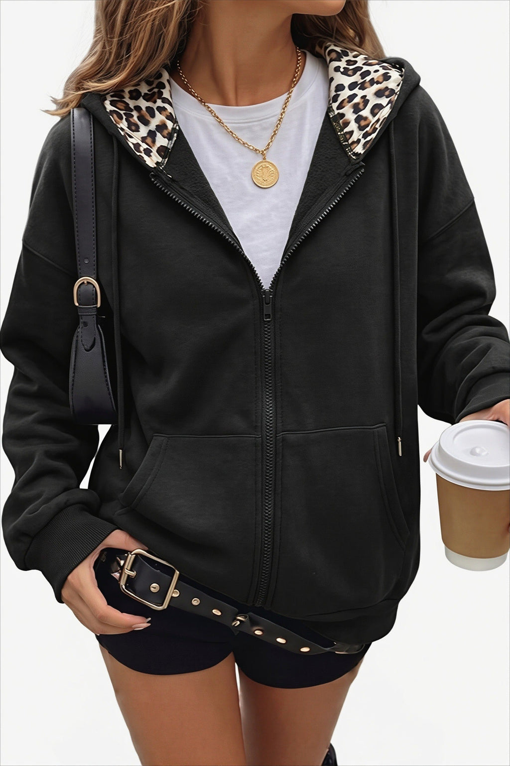 Women's oversized zip hoodie with leopard-print lined hood and front pockets
