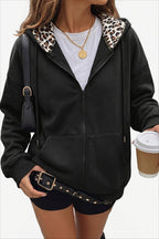 Women's oversized zip hoodie with leopard-print lined hood and front pockets
