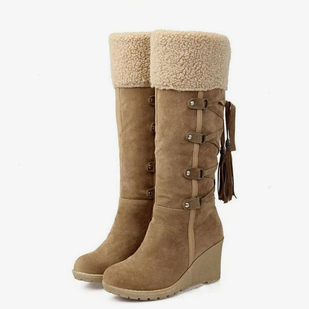 Women's knee-high wedge boots with textured trim, buckle straps and tassel detail