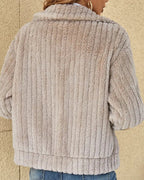 Women's hooded textured cardigan with long sleeves and zip front