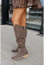 Women's high slouch boots with low heels, side zips and buckle details