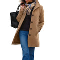 Women's long button front coat with notched lapels and side pockets
