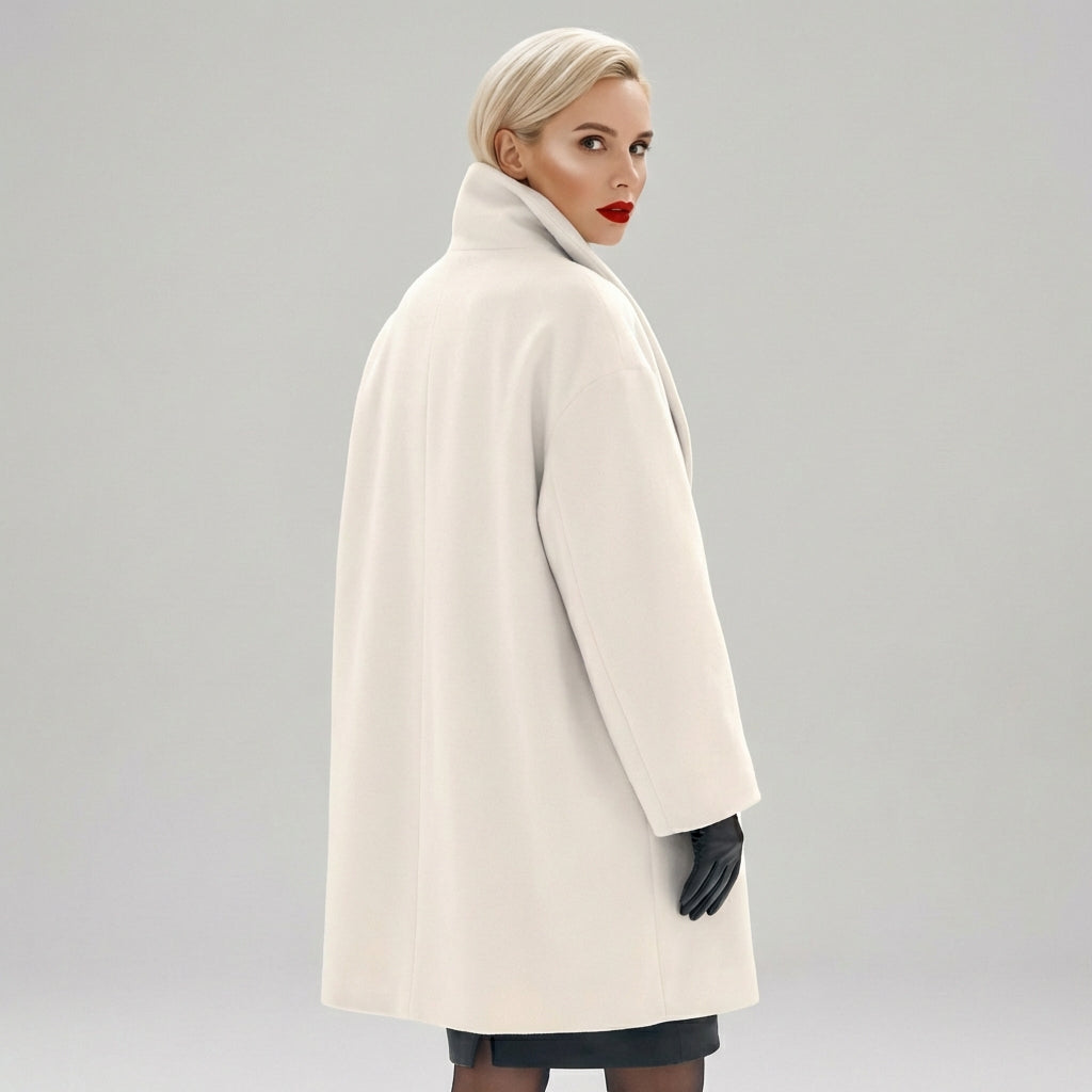Women's open front winter coat with wide lapels and flared cuffs
