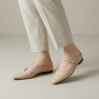 Women's pointed ballet flats with buckle straps and low heels