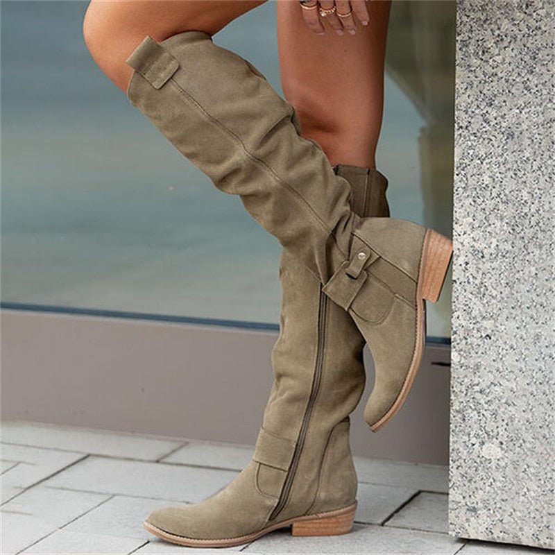 Women's high slouch boots with low heels, side zips and buckle details